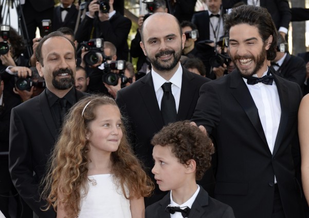 (From L) Iranian director Asghar Farhadi, French actress Jeanne Jestin, Iranian actor Ali Mosaffa, French actors Elyes Aguis and Tahar Rahim pose on May 17, 2013 as they arrive for the screening of their film "The Past" presented in Competition at the 66th edition of the Cannes Film Festival in Cannes. AFP PHOTO / ANNE-CHRISTINE POUJOULAT (Photo credit should read ANNE-CHRISTINE POUJOULAT/AFP/Getty Images)