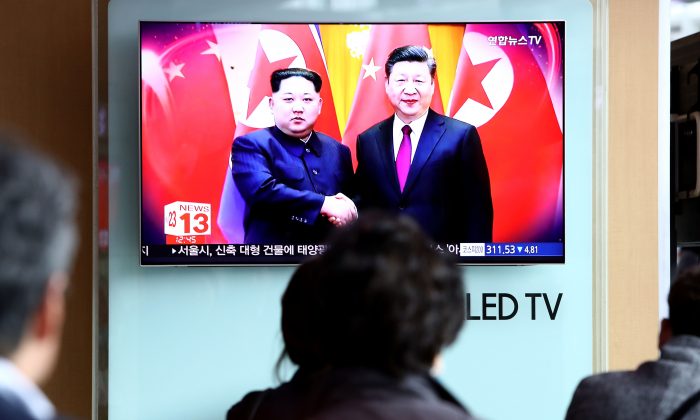 نیرهای متخاصم همزمان با شلیک موشک‌های کره شمالی، چین و این کشور بر اتحاد خود علیه «نیروهای متخاصم» تاکید کردند دومین بار از زمان جوبایدن