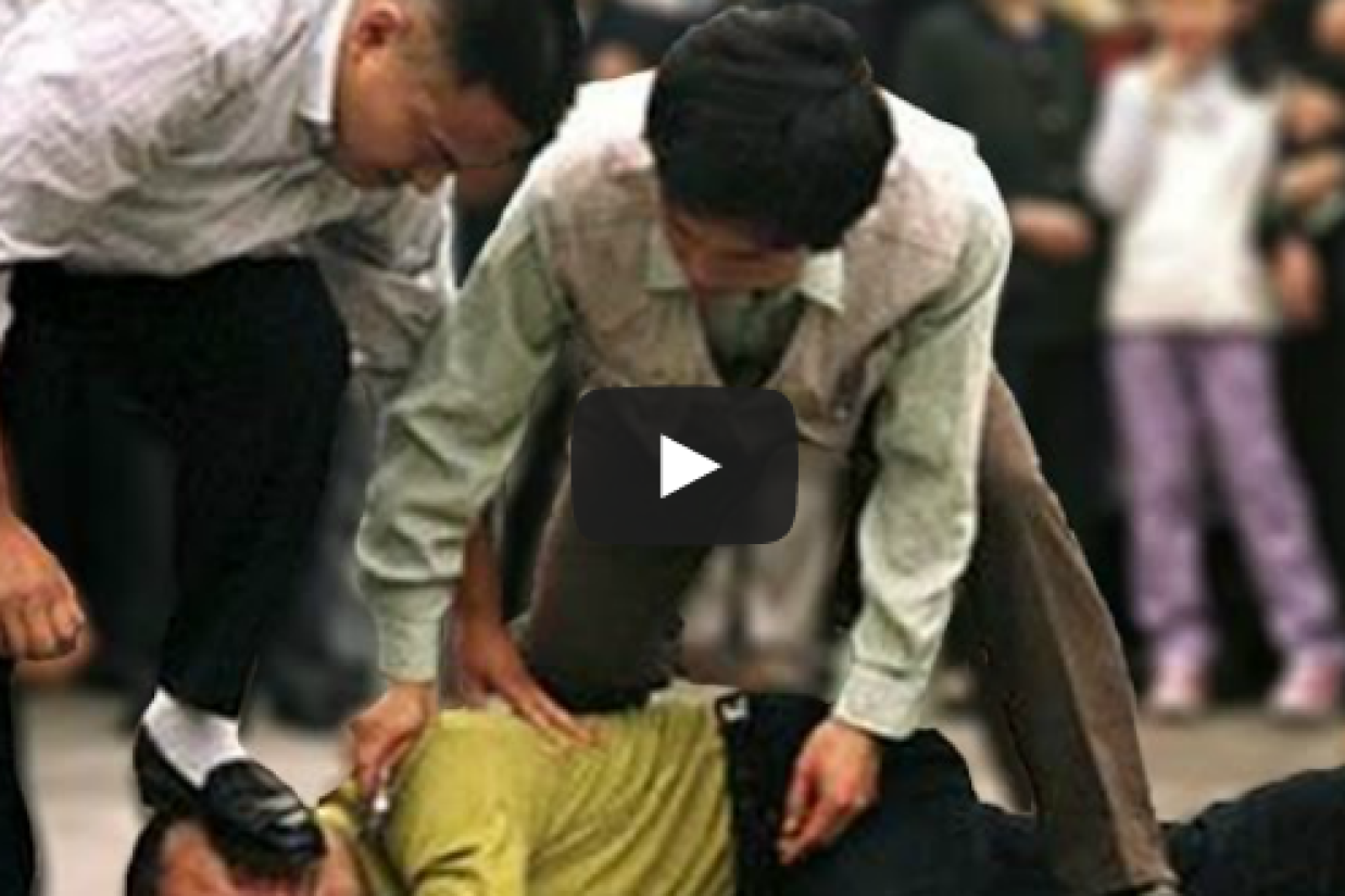 Falun Ging being Persecuted - Copy
