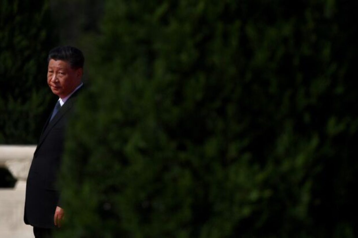 TOPSHOT - Chinese President Xi Jinping walks to the Monument to the Peoples Heroes during a wreath laying ceremony to honour deceased national heroes on Martyrs Day in Beijings Tiananmen Square on September 30, 2020. (Photo by Noel Celis / AFP) (Photo by NOEL CELIS/AFP via Getty Images)