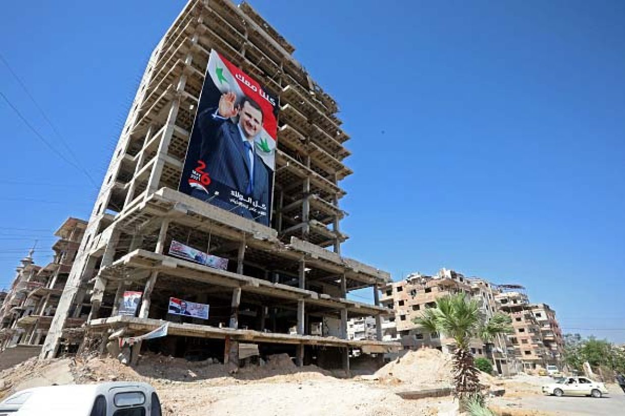 (LOUAI BESHARA/AFP via Getty Images)
بشار اسد