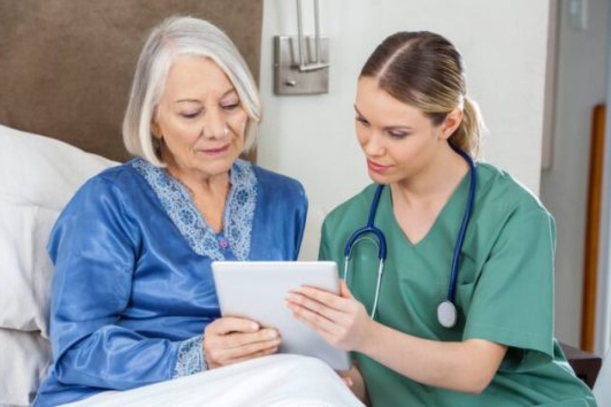 nurse-and-resident-talking-700x420-1-590x354